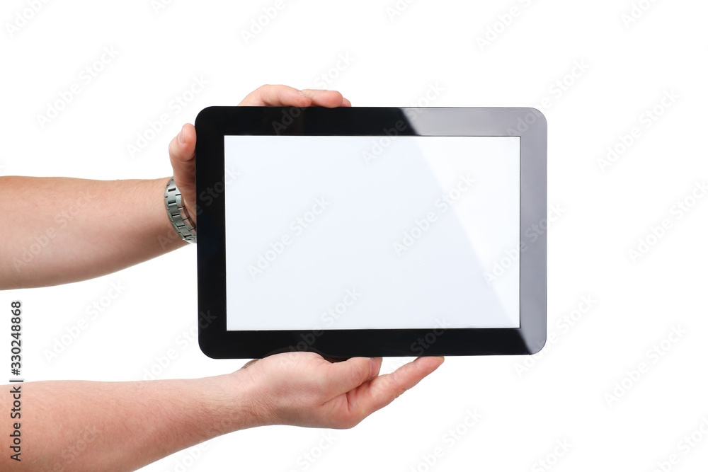 Man hoding black tablet frame in hand isolated on white closeup. Can insert an image image your text for the concept or project development of mobile applications, their advertising for mobile devices Man hoding black tablet frame in hand isolated on white closeup. Can insert an image image your text for the concept or project development of mobile applications, their advertising for mobile devices