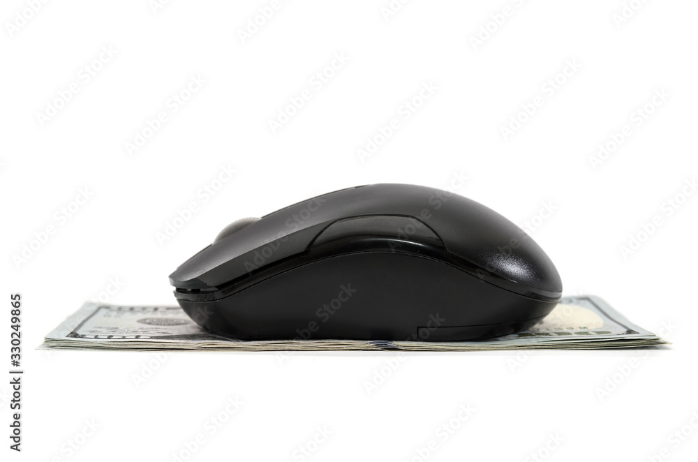 computer mouse on dollars isolated on a white background. Side view. Close-up.