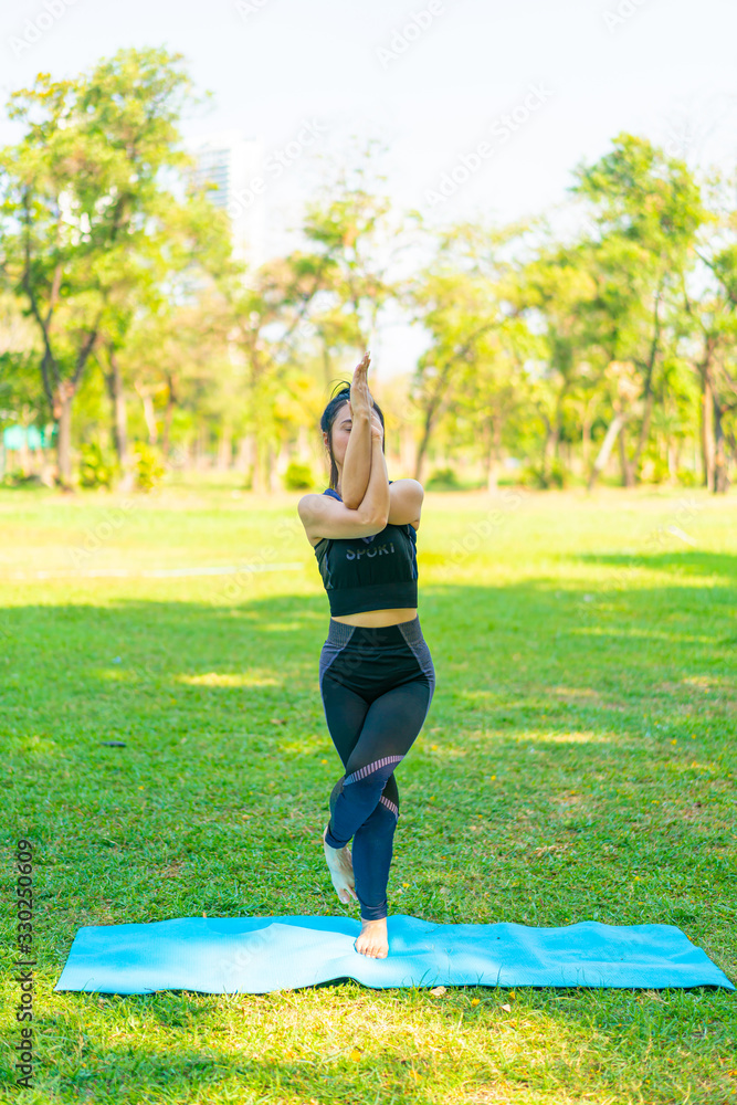 Asian woman doing yoga exercise and relax Asian woman doing yoga exercise and relax