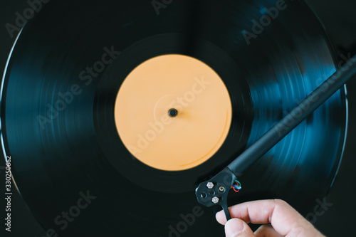 Bilde på lerret Playing vinyl record. Close up of set up tonearm on record
