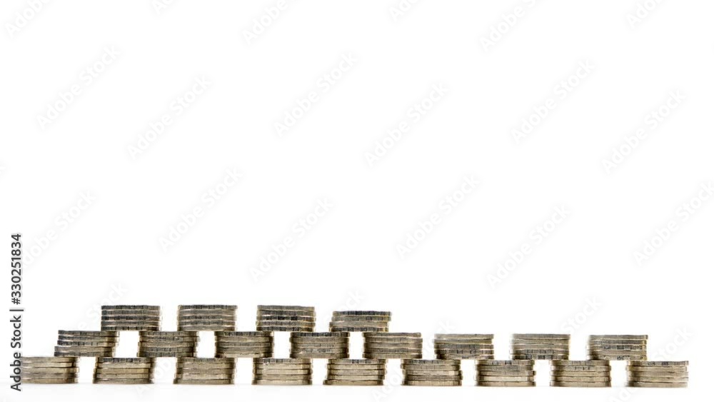 Coins on stack on white background - stop motion . Coins on stack on white background - stop motion .