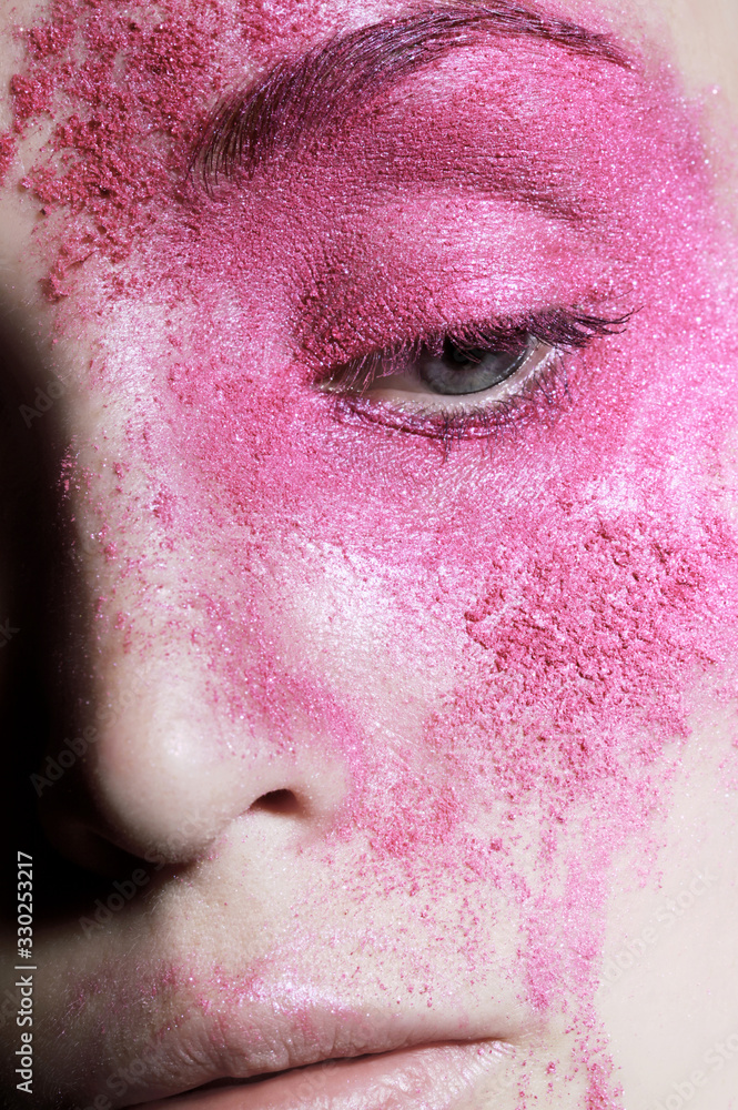 Pink powder on skin