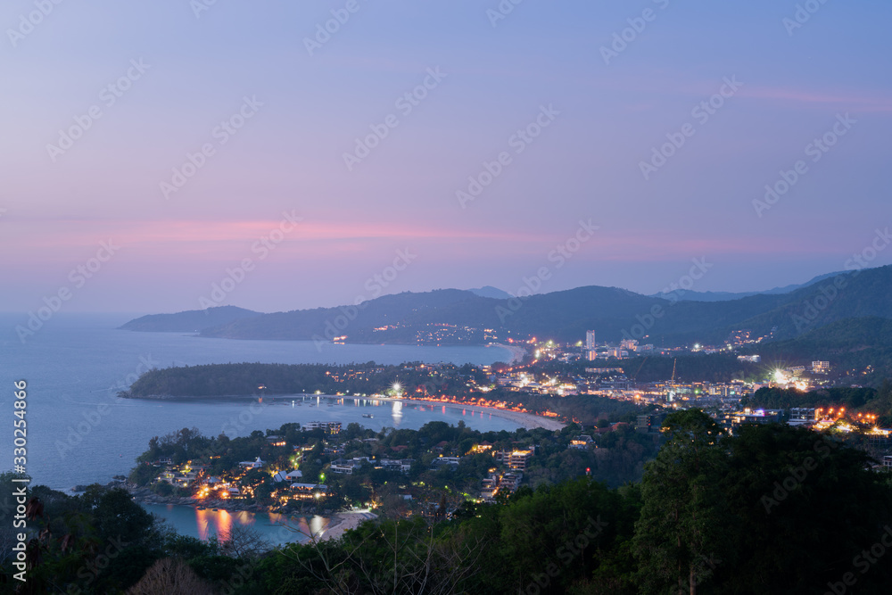 Kata beach and Karon beach viewpoint in twilight time and night light city view