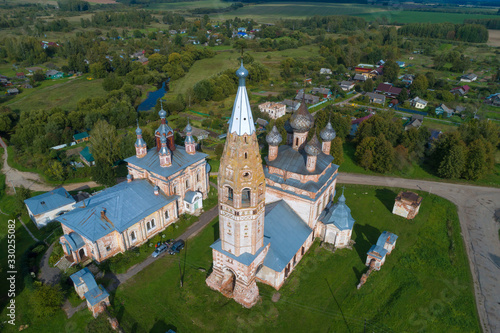 Top view of the ancient temple complex of Parskoye village on a September sunny day (aerial photography). Ivanovo region, Russia photo