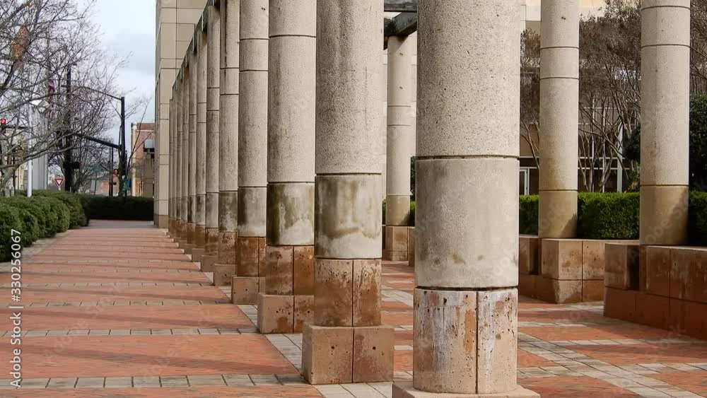Left To Right Pan Of Pillars At Dennys Headquarters Building Revealing Dennys Fast Food Restaurant Sign Left To Right Pan Of Pillars At Dennys Headquarters Building Revealing Dennys Fast Food Restaurant Sign