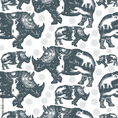 Rhinoceros. Seamless pattern. Packing old paper, scrapbooking style. Vintage background. Medieval manuscript, engraving art. Rhino double exposure. Symbol Africa, savannah, travel