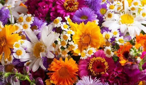 bouquet of various summer flowers as background