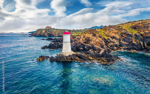 View from flying drone. Marvelous morning view of di Capo Ferro Lighthose. Splendid summer scene of Sardinia island, Italy, Europe. Nice Mediterranean seascape. Traveling concept background.