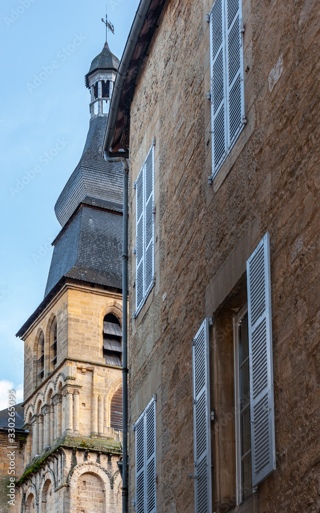 Sarlat in Aquitaine, France. The capital of Périgord Noir, a medieval village full of picturesque alleys and monuments. View of the bell tower of the Gothic Romanesque Cathedral of 