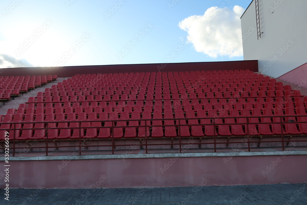  red sports stadium with a large number of seats