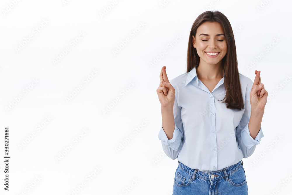 Hope get raise and be promoted. Successful hopeful charming young woman cross fingers good luck, wishing business go well, close eyes and smiling optimistic, praying for dream come true Hope get raise and be promoted. Successful hopeful charming young woman cross fingers good luck, wishing business go well, close eyes and smiling optimistic, praying for dream come true