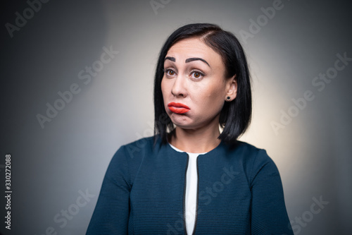 Billede på lærred studio shot of brunette female has aggression and disgust