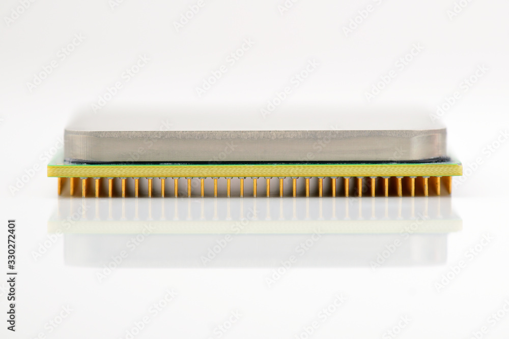 CPU - central processor unit. Golden pins of a core. Copy space. Shallow depth of field. CPU - central processor unit. Golden pins of a core. Copy space. Shallow depth of field.