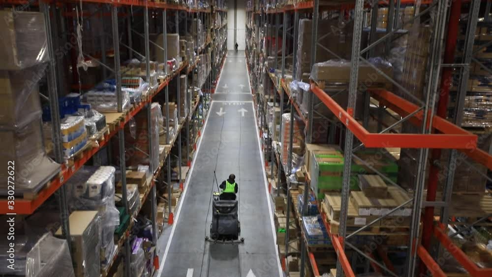 Warehouse with cardboard boxes inside on pallets racks, logistic center. Warehouse with cardboard boxes inside on pallets racks, logistic center.