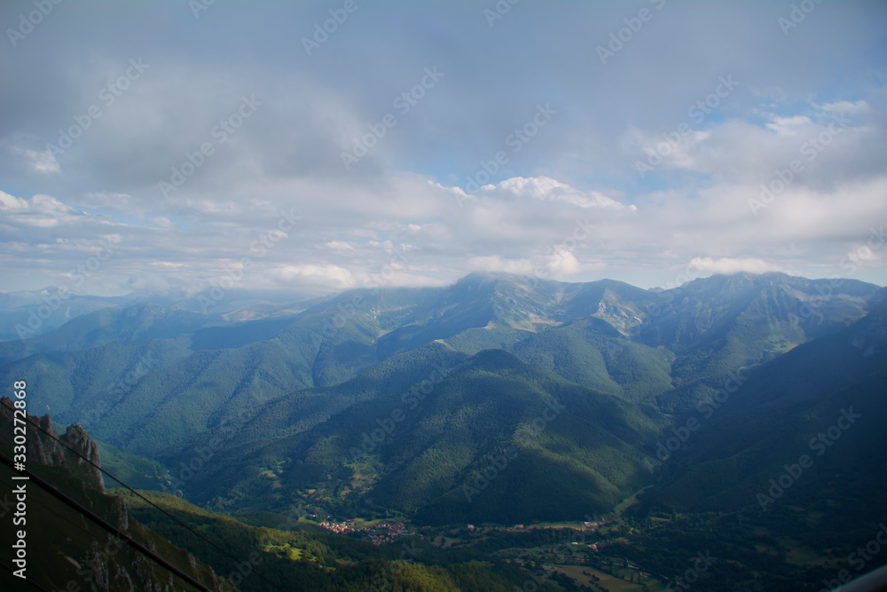Fototapeta premium High mountains full of fog and clouds,