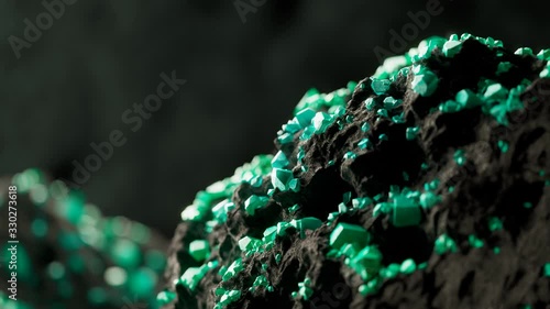 Green uranium ore gems in a mine. Glowing green radioactive ore in close up 4KHD photo
