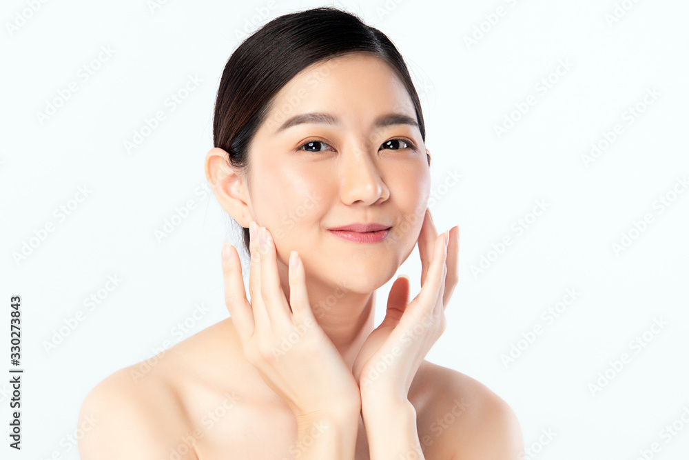 Beautiful Young Asian Woman with Clean Fresh Skin. Face care, Facial treatment, Cosmetology, beauty and healthy skin and cosmetic concept .woman beauty skin isolated on white background Beautiful Young Asian Woman with Clean Fresh Skin. Face care, Facial treatment, Cosmetology, beauty and healthy skin and cosmetic concept .woman beauty skin isolated on white background