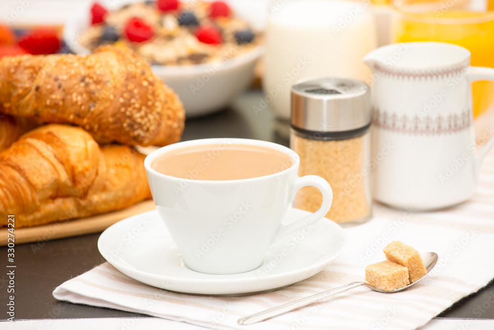 Breakfast Served in the morning with Hot black coffee and croissants Natural corn flake breakfast cereal in cups and fruit on the breakfast table every day Breakfast Served in the morning with Hot black coffee and croissants Natural corn flake breakfast cereal in cups and fruit on the breakfast table every day