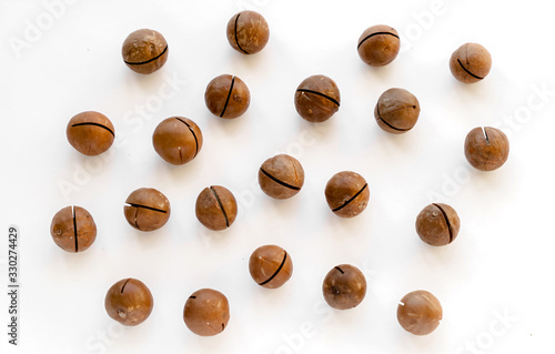 Wallpaper Mural Macadamia nuts in the shell isolated on a white background close-up. Torontodigital.ca