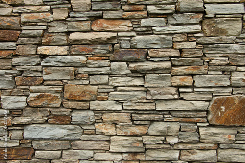 Otago schist stone wall texture. Background pattern.