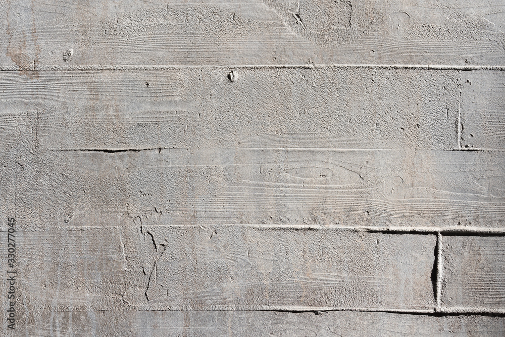Naklejka premium Background and texture image of casted concrete wall with horizontal marks from wood boards
