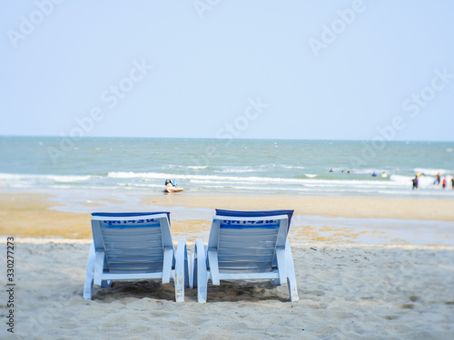 two chairs on the beach