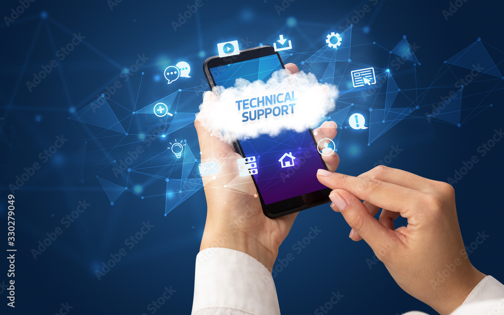 Female hand holding smartphone with TECHNICAL SUPPORT inscription, cloud technology concept Female hand holding smartphone with TECHNICAL SUPPORT inscription, cloud technology concept