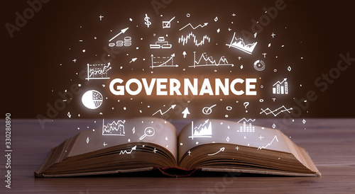 GOVERNANCE inscription coming out from an open book, business concept