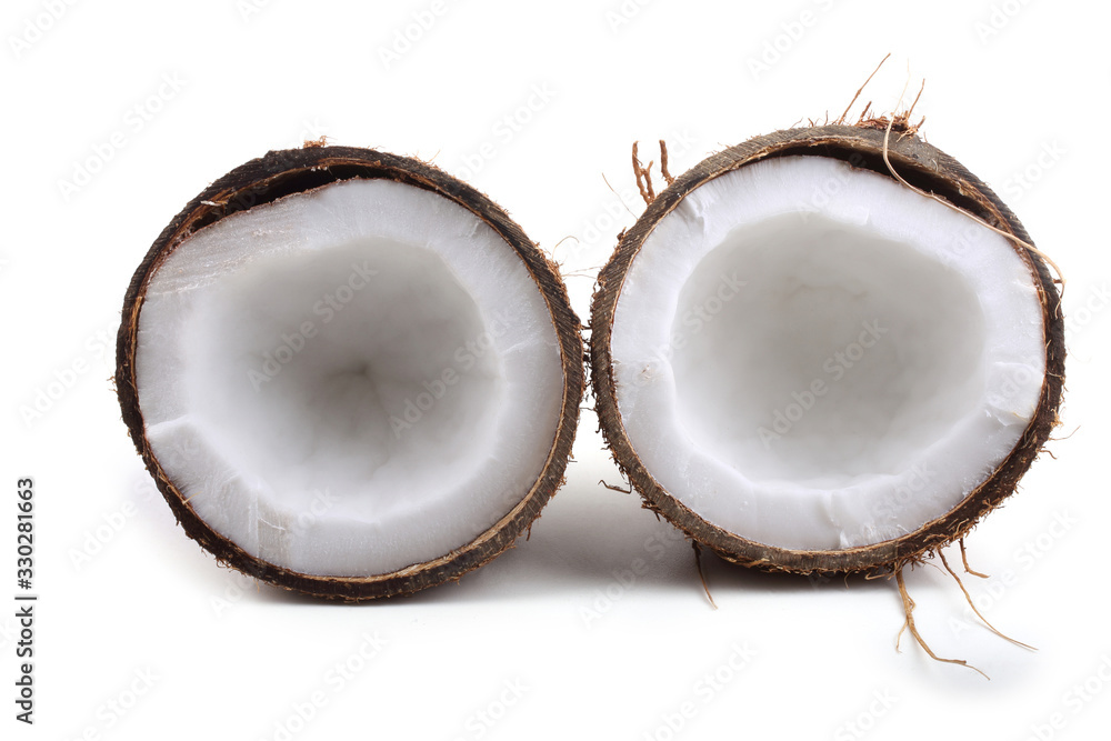 Coconut halves isolated on white Coconut halves isolated on white