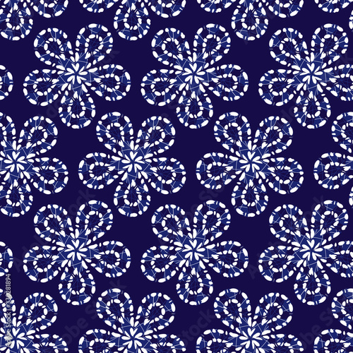 Vector blue shibori bigger floral pattern seamless background. Suitable for textile, gift wrap and wallpaper.
