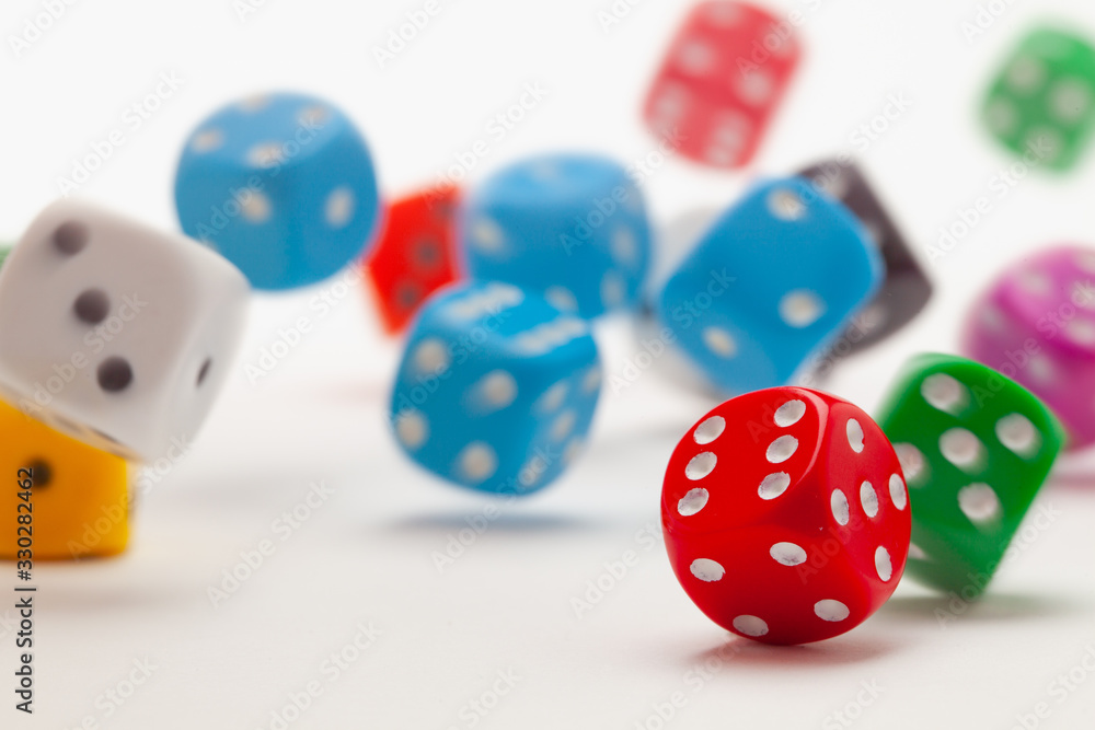 Playing dice at white wooden background. Playing dice at white wooden background.