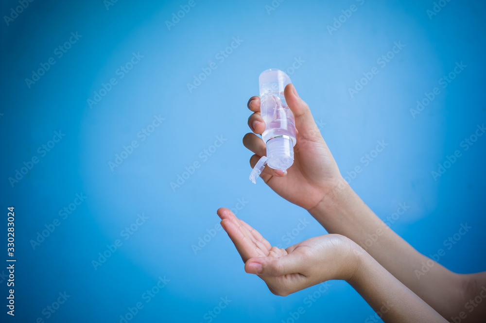 Asian people using alcohol antiseptic gel ,prevent against infection of Covid-19 outbreak,woman washing hands with hand sanitizer to avoid contaminating with Corona virus Asian people using alcohol antiseptic gel ,prevent against infection of Covid-19 outbreak,woman washing hands with hand sanitizer to avoid contaminating with Corona virus