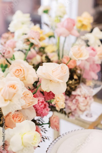 Beautiful luxury bouquet of mixed flowers. Wedding details. Wedding rings