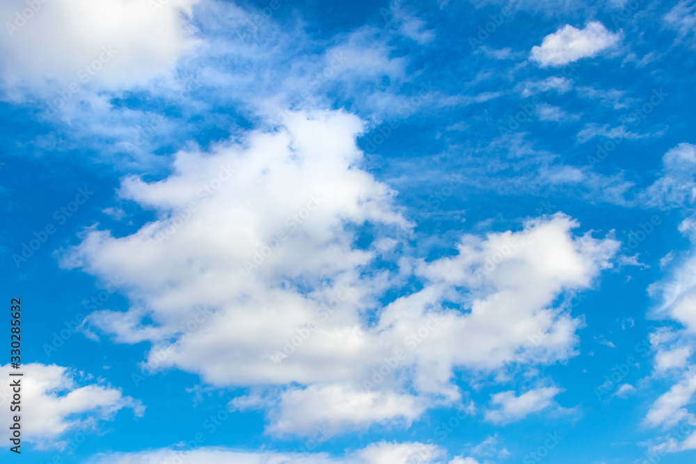 White clouds in the blue sky in sunny weather_ White clouds in the blue sky in sunny weather_