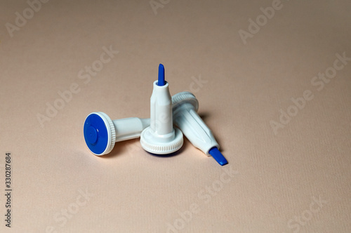 Foto adult blue lancet on a color background.