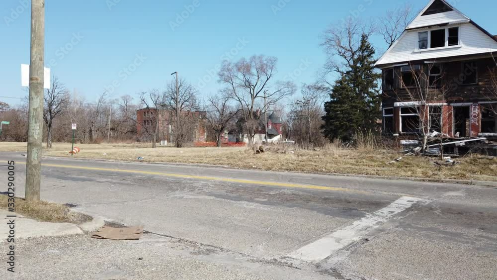 Right To Left Pan Of Depressed Housing In Ghetto Neighbourhood In