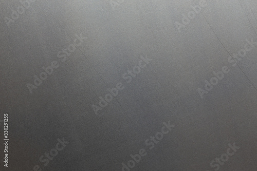 Fotografie Uncoated flat cold rolled steel sheet surface with minor long scratches
