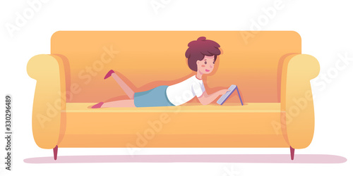 Boy and digital tablet on sofa isolated on white