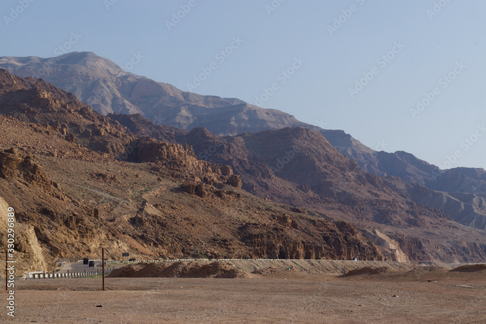 Landscape view of the Dead Sea highway and hills in the Spring in Jordan