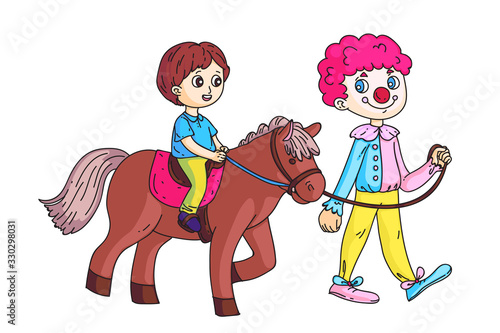 Happy little boy riding horse led by circus clown