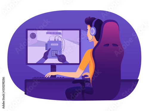 Man in headset playing video game at computer