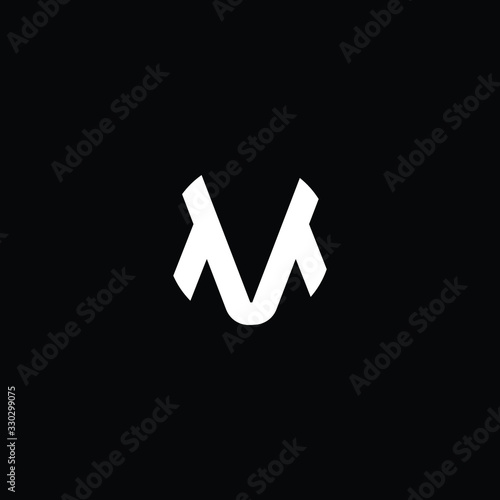  Minimal elegant monogram art logo. Outstanding professional trendy awesome artistic MV VM initial based Alphabet icon logo. Premium Business logo White color on black background