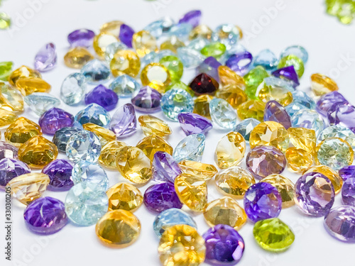 Collection of many different natural gemstones on the white background. Jewel Gem on White shine color  Collection of many different natural gemstones. Copy space with wallpaper