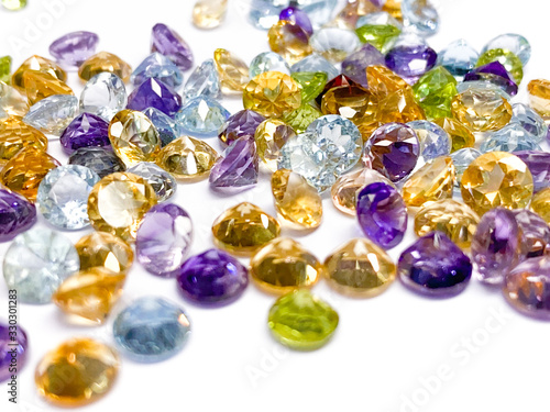 Collection of many different natural gemstones on the white background. Jewel Gem on White shine color, Collection of many different natural gemstones. Copy space with wallpaper