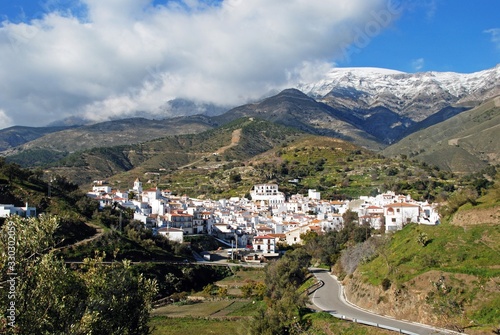 View of the town and surrounding countryside, Sedella, Spain. photo