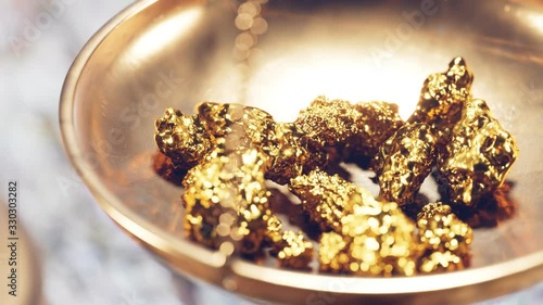 Antique Jewellery scale with small gold nuggets. Wealth, treasure background