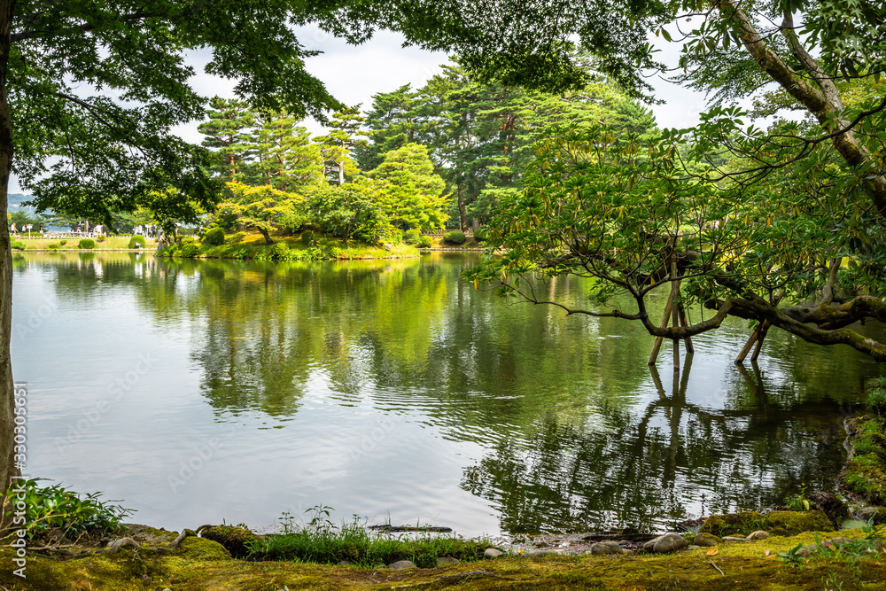 View of Kenrokuen garden during summer in Kanazawa. It is considered one of the three most beautiful gardens of Japan