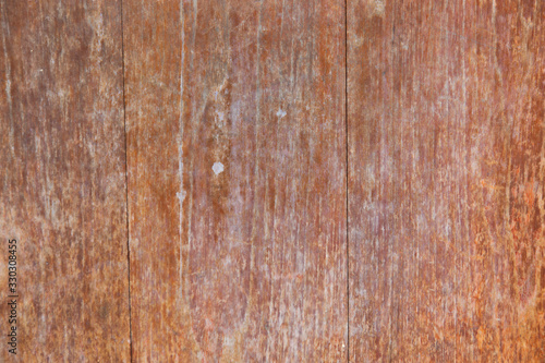 The background image of the thick brown plank has vertical woodwork which passes both time and the environment causing a trace of various beautiful colours.
