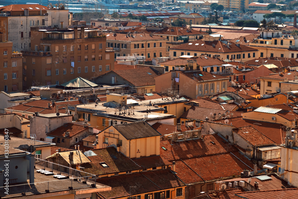 View of city of La Spezia in Italy with red roof and old houses from above in sunny weather, Italy, Europe