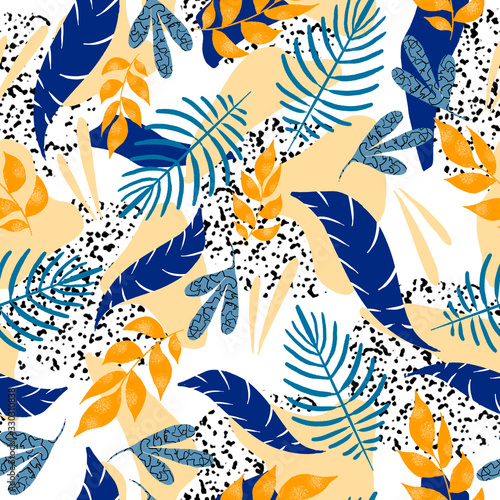 Seamless pattern of tropical leaves and flowers